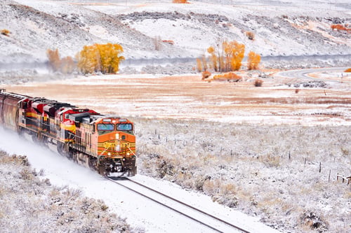 Preview: Train transporting tank cars. Season changing autumn to winter.