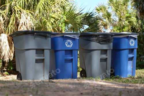 Preview: Garbage cans for separate disposal of recycle trash on city street
