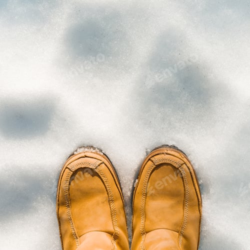 Preview: Womens legs in boots in the snow, winter is coming