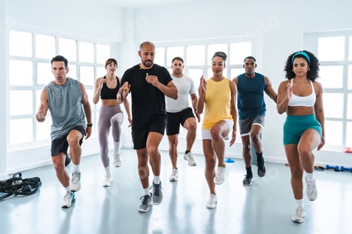 Preview: Athletes doing functional training workout in a bright gym