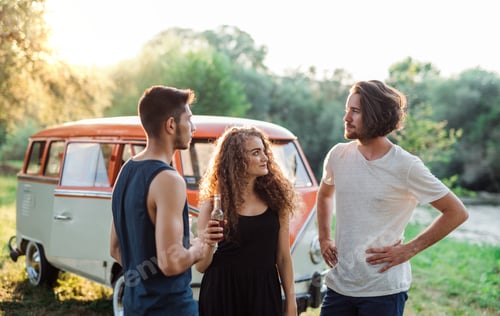Preview: Two boys quarreling over a young girl on a roadtrip through countryside.