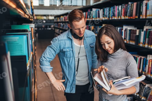 Preview: Students choosing a book in a library