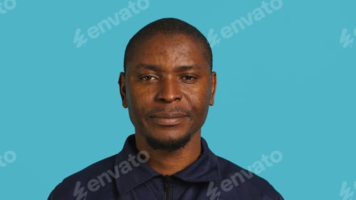 Preview: Portrait of security agent celebrating achievements after securing post