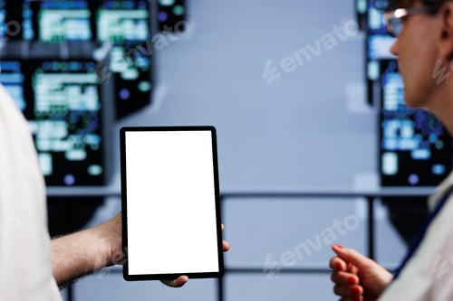 Preview: Colleagues using tablet in data center