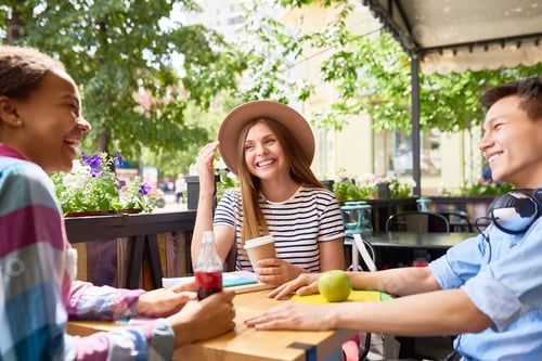 Preview: Young People at Lunch in Outdoor Cafe