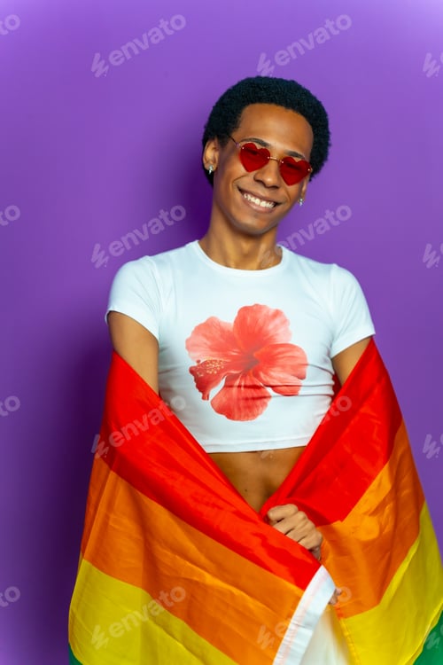 Preview: Transgender latin man wrapped with lgbt flag