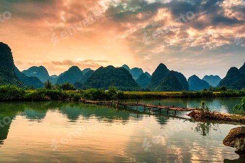Preview: Sunset sky over Phong Nam Valley with rice fields in countryside