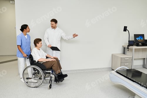 Preview: Professional healthcare team prepares patient for MRI scan in modern hospital setting
