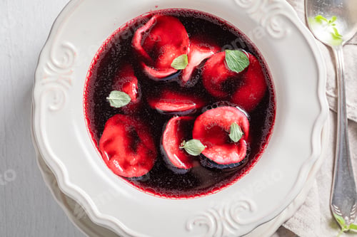 Preview: Spicy beetroot soup with dumplings and seasoned with marjoram