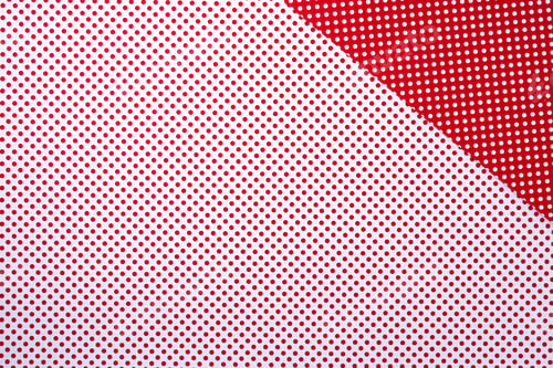 Preview: top view of vivid red and white surface with polka dot pattern for background