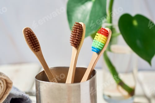 Preview: Eco-friendly bamboo toothbrushes. Natural organic bathroom beauty product concept.