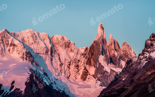 Preview: Pink sunset view of Cerro Torre and Fitz Roy mountain ranges Los Glaciares National Park, Patagonia,