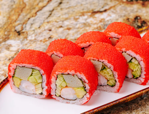 Preview: Colorful sushi rolls displayed on a white plate with a textured background