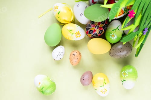 Preview: easter celebration concept. Top view photo of colorful easter eggs