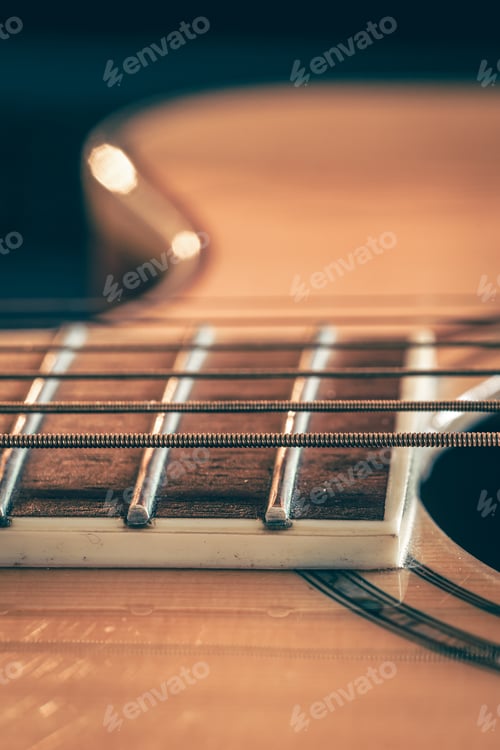 Preview: Strings on a classical acoustic guitar, macro shot.