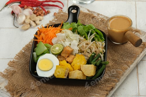 Preview: Gado Gado Indonesian Mix vegetables Salad from Boiled or Steam Vegetable Served with Peanut Sauce.