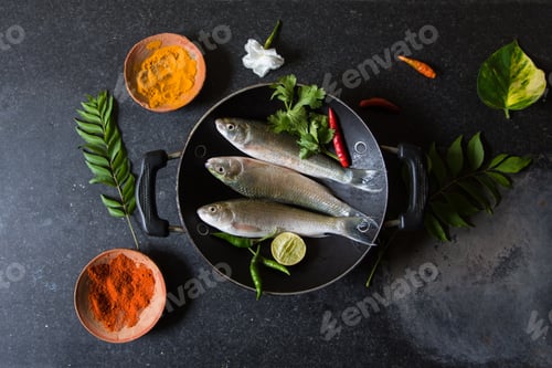 Preview: Fish in cooking pan