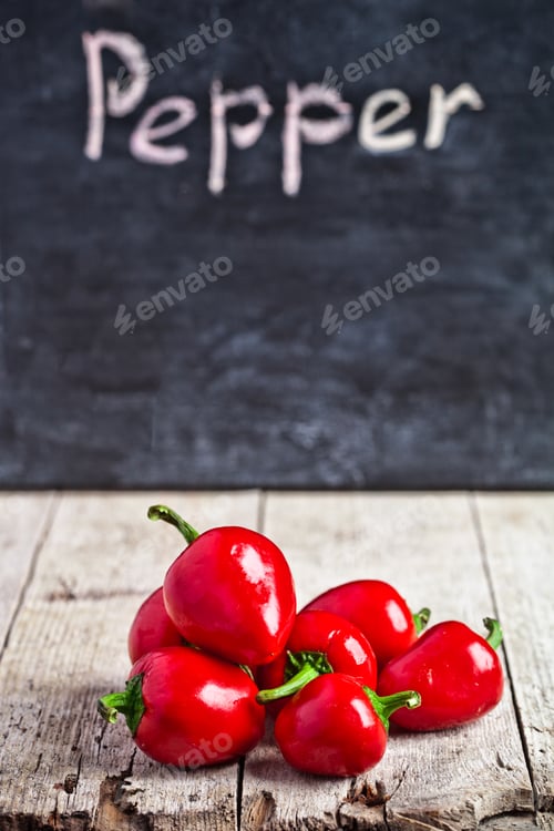 Preview: red hot peppers and blackboard