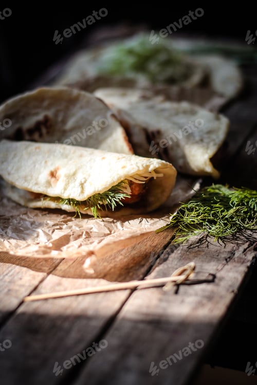 Preview: Tortilla With Meat Balls And Sauce Tomato (Tacos), Fresh Herbs On A Wooden Surface