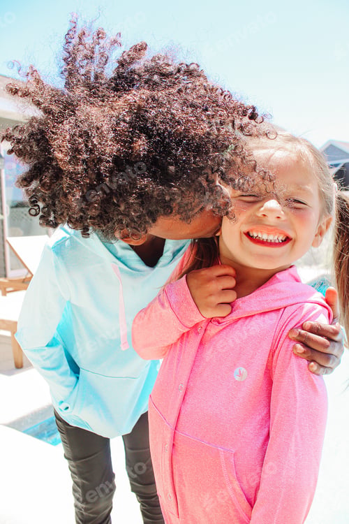 Preview: Brother kissing sister’s cheek
