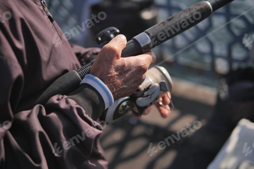 Preview: Fisherman with rod, spinning reel ,