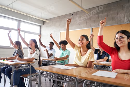 Preview: Multi-ethnic students in the classroom with hands raised