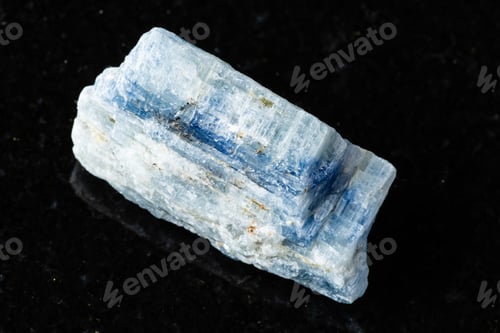 Preview: sample of uncut kyanite rock on black granite