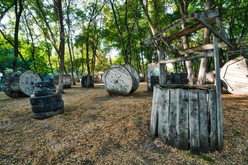 Preview: The old broken well was used as a fence at the paintball base