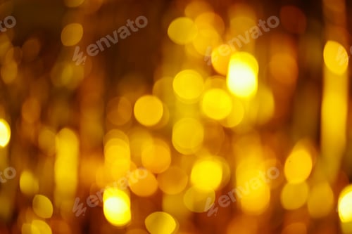 Preview: Blurred golden bokeh background.