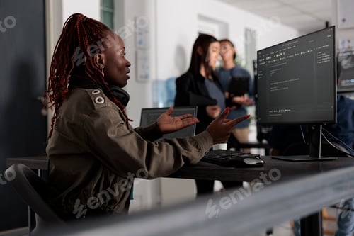 Preview: African american system engineer working on html code development