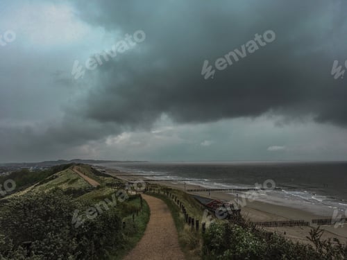 Preview: Overcast Day at the Beach by the Sea