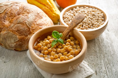 Preview: chickpeas soup on wood bowl