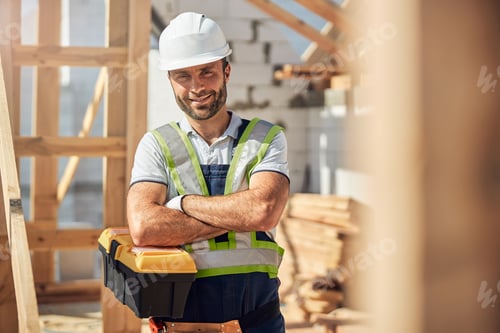 Preview: Kind brunette male person crossing arms on chest