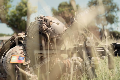 Preview: Special forces soldier in camouflage with a pair of weapons that are full of modern technology