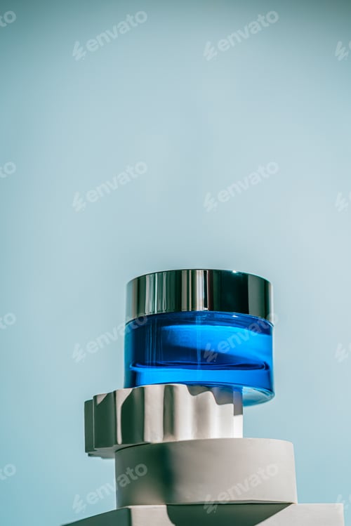 Preview: A blue glass jar of revitalizing face night cream