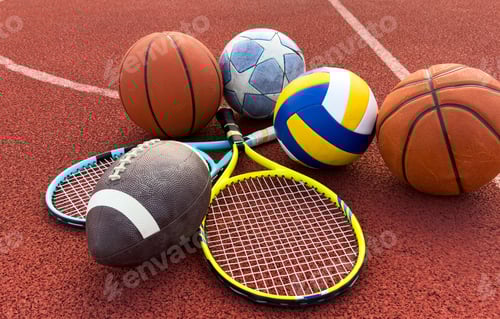 Preview: A variety of sports equipment including an american football, a soccer ball, a tennis racket, a