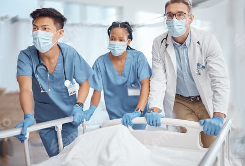 Preview: Rush, bed and doctors in hospital for emergency operation in ER with a sick patient or face mask. S