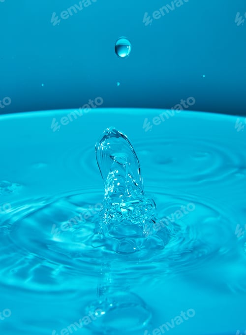 Preview: Abstract background of splash of color water, collision of colored drops, the concept