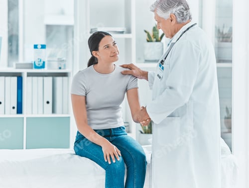 Preview: He takes care of me. Shot of a senior doctor shaking hands with a patient in greeting.
