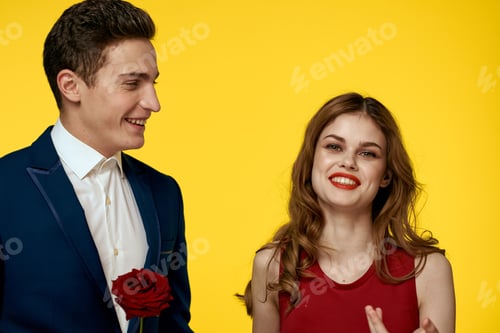 Preview: Couple in love man and woman with red rose classic costume red dress model