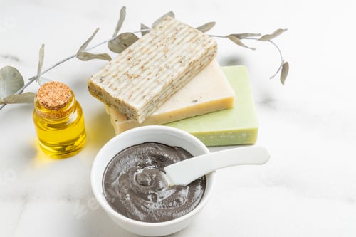 Preview: natural eco beauty products on marble background, clay mask for facial or body, handmade herbal soap