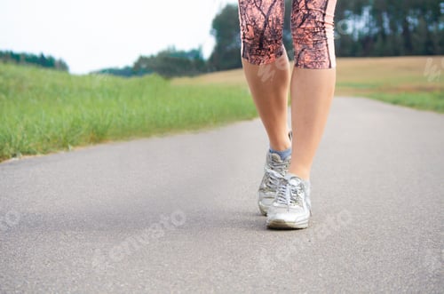 Preview: young girl in tracksuit on treadmill,