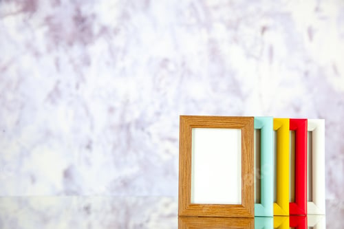 Preview: front view different picture frames with colored corners on light background photo portrait picture
