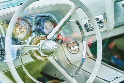 Preview: Retro car dashboard with srteering wheel