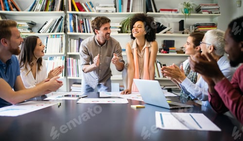 Preview: Creative business people working on business project in office