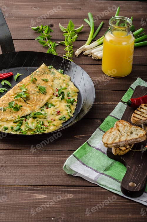 Preview: Cheese omelet with spring onions, herbs and chilli