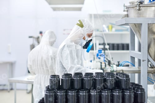 Preview: Factory employees working in protective clothing