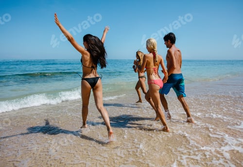Preview: Active people having fun on the beach