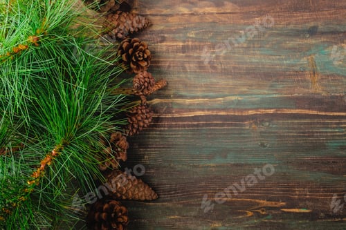 Preview: Christmas pine tree fir with pine cone decoration on vintage rustic wood table background
