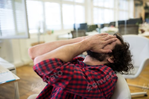 Preview: Frustrated business executive at desk